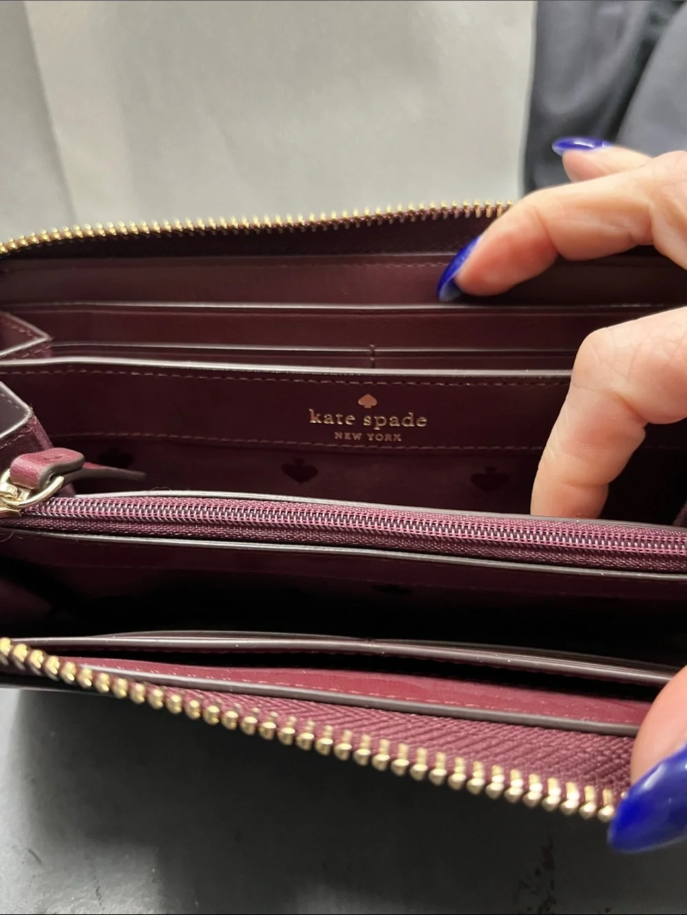NWOT Kate Spade pink floral on dark maroon zip-around wallet